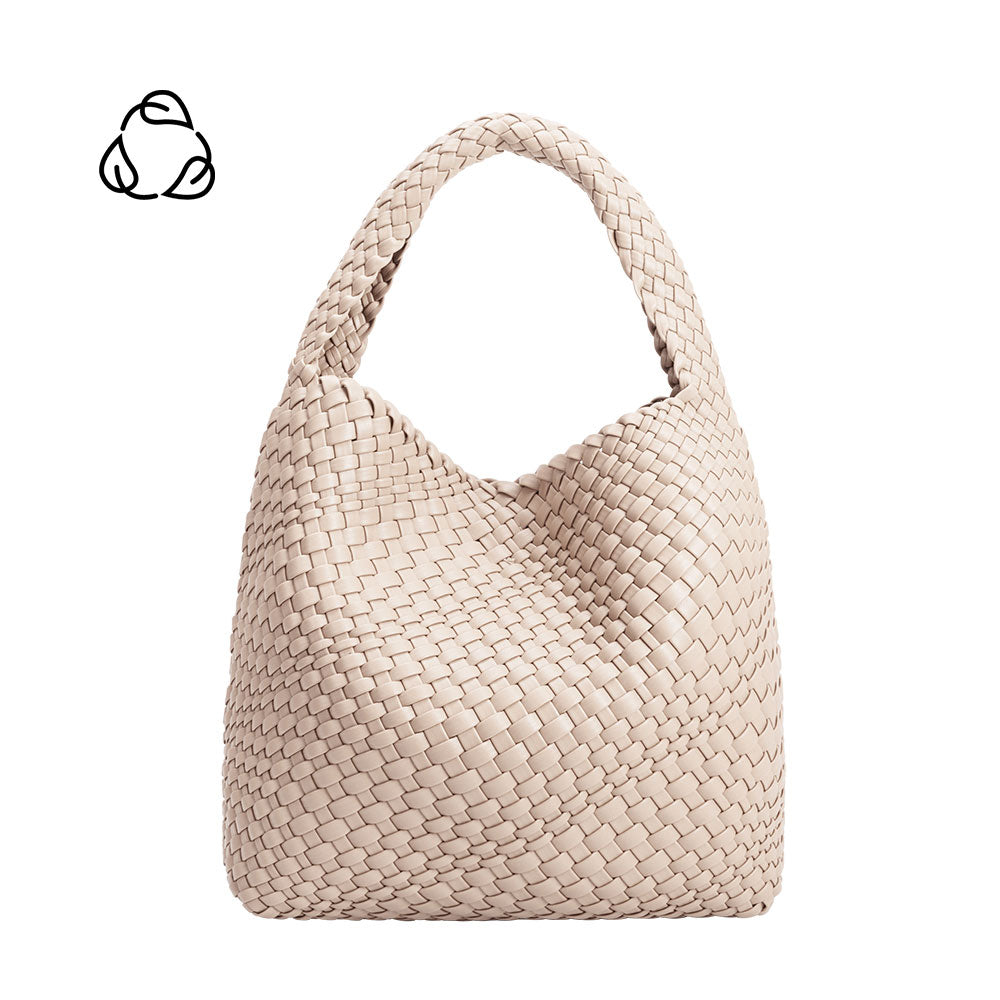 A large ivory handwoven recycled vegan leather shoulder bag.
